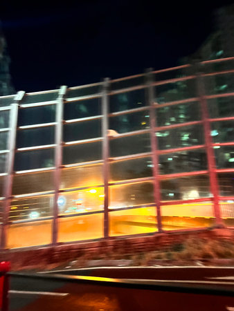 Abstract motion blur effect. City street at night with light trails.