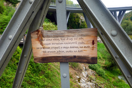 Sign on the bridge over the river Rhine in Garmisch-Partenkirchen, Germanyの写真素材