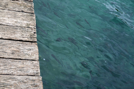Wooden pier in the sea, close-up, background.の写真素材