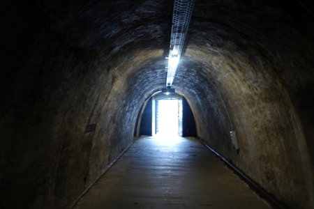 Underground tunnel. Underground passage. Light from the end of the tunnel.の写真素材