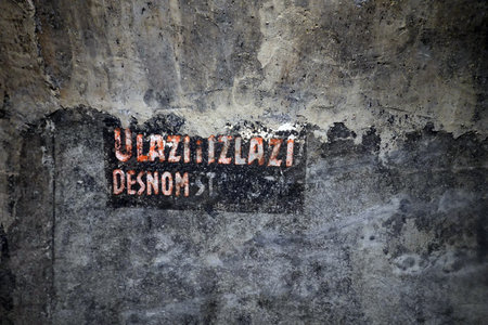 Weathered wall with a sign with the words Venice, Italy.の写真素材