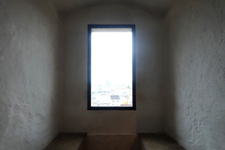 Window with a view of the city of Bangkok from the basement.