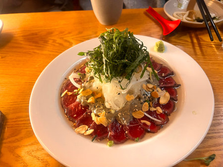 Tuna salad on a white plate in a restaurant, Thailand.
