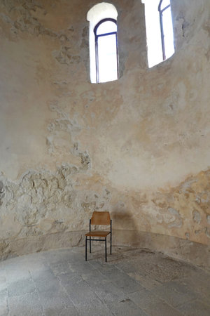 Old wooden chair in the old church. Interior of the church.の写真素材