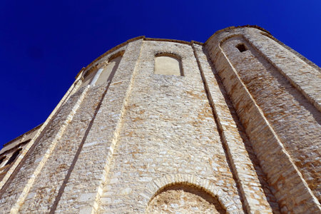 Tower of the Church of St. Francis of Assisi in Assisi, Italyの写真素材