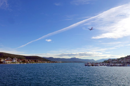 Airplane in the bay of Budva.の写真素材