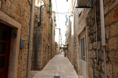 Narrow street of the old city of Dubrovnik, Croatiaの写真素材