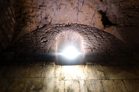 Light from the light in the cave of the ancient city of Chersonesosの写真素材