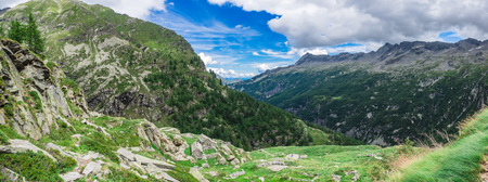 View of Valle d'Antrona from hiking trail to Cingino Lake, in Natural Park of Alta Valle Antrona, Piedmont, Italyの写真素材