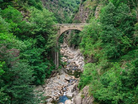 Casletto Bridge in Val Grande National Park in Piedmont, Italyの写真素材