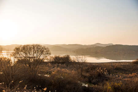 Scenery lake landscape with wonderful sunset. Incredible nature background.の写真素材