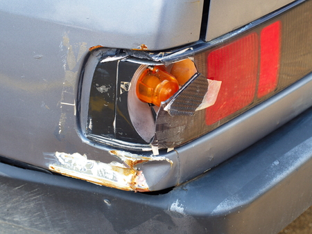 damaged car. traffic accident. the car's signal lamp is brokenの写真素材
