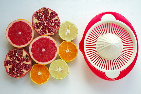 Mixed citrus juice preparation. heap of fresh organic fruits. top view close upの写真素材