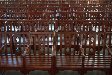 historic conference room. auditorium. sorted wooden chairsの写真素材