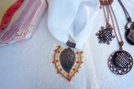 necklace and scarf models. it's made of needle lace. embroidery handcrafted