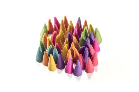Colorful incense cones with white backgroundの写真素材