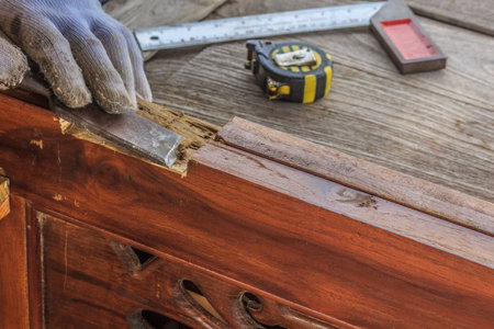 Close up the chisel to sharpen the wood plank