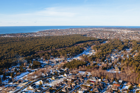 Aerial view on private houses in a forest Viimsi, Estoniaの写真素材