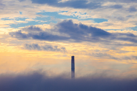 Pipe of THERMAL POWER STATION in the cloud a morning skyの写真素材