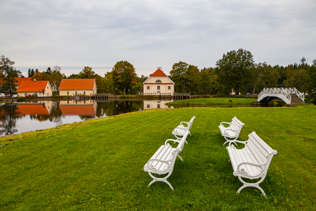 Benches on island in small pond of Vihula Manor in the north of Estonia. 18th century. Tourist destination.の写真素材