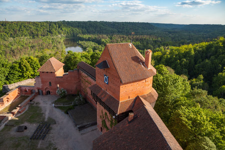 Ruins of medieval Turaida castle with clock tower in Latvia. Summer daytime.の写真素材