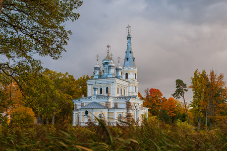 Sunset landscape of beautiful Orthodox church near lake with forest. Stameriena, Latvia.の写真素材