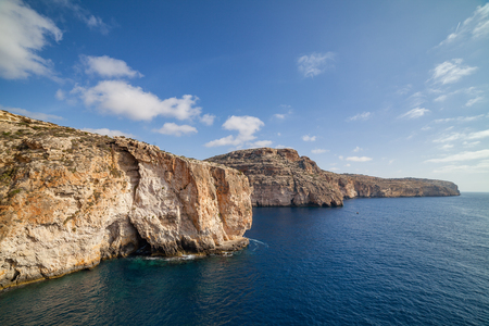 Blue Grotto limestone cliff, majestic nature landmark of Malta islandの写真素材