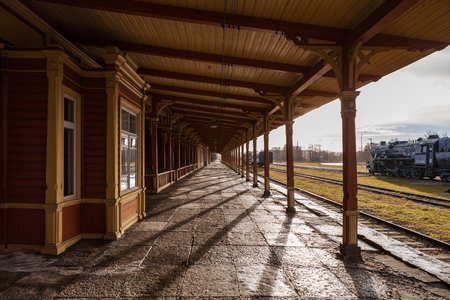 Old train station. Wooden wrok from last century, vintage style of Northern Europe.の写真素材