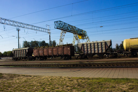 Smolevichi, Belarus - September 27, 2019: train freight cars transport bulky goods, stop at the...