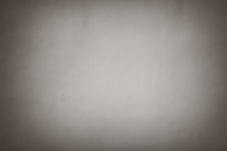 White cement wall with darkened edges, rough dark plaster wall with a bright spot, background for...