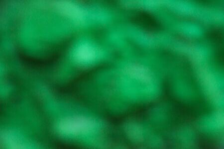 Natural green textured background with abstract blurred grunge cement materialの写真素材