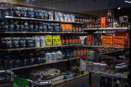 Minsk, Belarus - november 1, 2019 : Diversity of food supplements in sport nutrition store.のeditorial素材