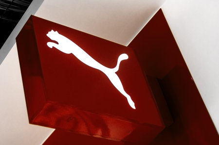 Minsk, Belarus - november 1, 2019: white icon of brand Puma on red background. Puma is a German...