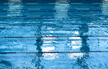 Blue swimming pool with lanes