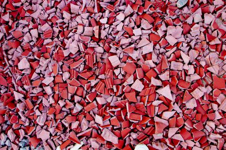 red broken tiles, slate on the ground, path close upの写真素材