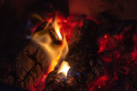 Details coals in a campfire blurry close up with long exposure
