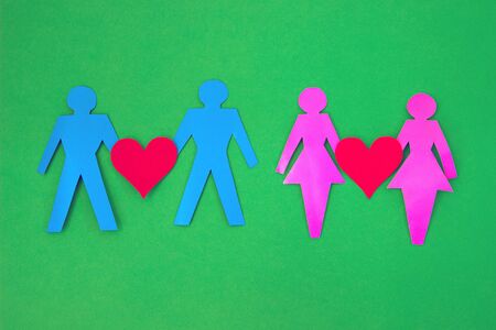 demonstrations same sex couples in love on green background. Human rights and tolerance concept. a symbol of the LGBT.の写真素材