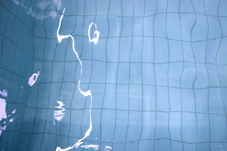 surface of swimming pool,background of water in swimming pool.