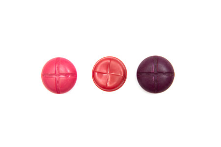 Decorative red Colorful Vintage Sewing or Scrapbook Buttons on white background