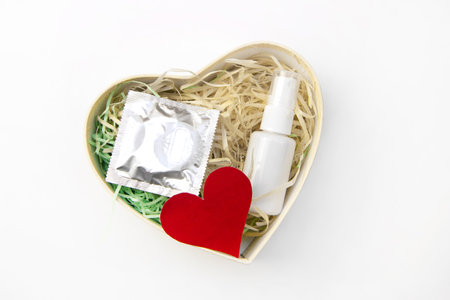 Celebrating Valentines Day in Lockdown Concept, flat lay. Creative minimal concept of Valentines Day during the pandemic covid-19 and stay at home quarantineの写真素材