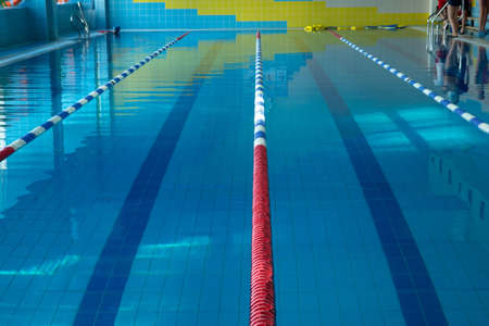 Interior of public swimming pool. empty pool before swimming lessons