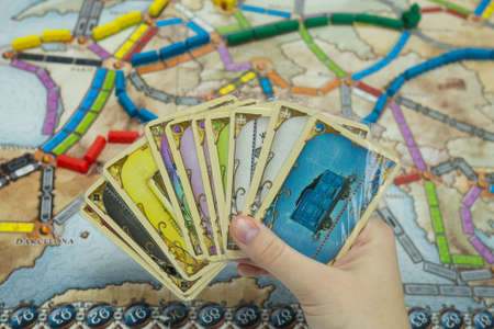 Minsk, BELARUS - November 3, 2021: Strategic board game ticket to ride with trains, trade and expansion options on a map of Europeのeditorial素材