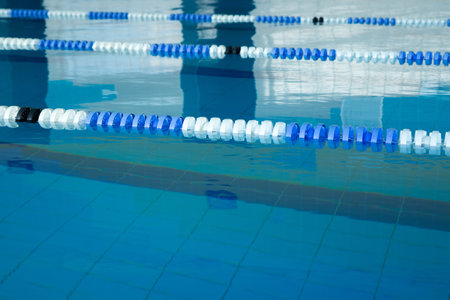 Background of water and markers in the swimming pool, close upの写真素材