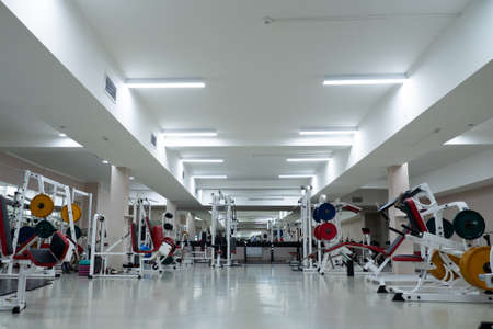 gym modern fitness center room. empty hall with simulators on different muscles. no peopleの写真素材