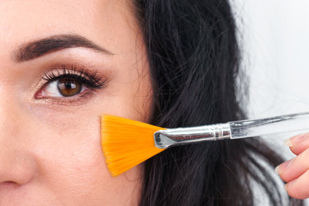 Sillicone brush cleansing Cosmetology device close up nead face. Using for procedure for skincare...