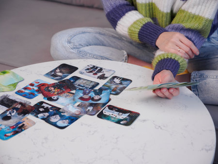 Psychotherapist using Metaphorical associative cards on psychological reception. alternative methods of psychotherapy. projective psychological technique. Minsk, Belarus, January, 16, 2023のeditorial素材