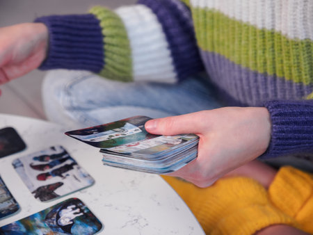 Psychotherapist using Metaphorical associative cards on psychological reception. alternative methods of psychotherapy. projective psychological technique. Minsk, Belarus, January, 16, 2023のeditorial素材