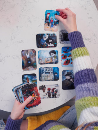 Psychotherapist using Metaphorical associative cards on psychological reception. alternative methods of psychotherapy. projective psychological technique. Minsk, Belarus, January, 16, 2023のeditorial素材