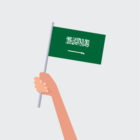 Saudi Arabia flag in hand. National flag of Saudi Arabia vector illustrationのイラスト素材