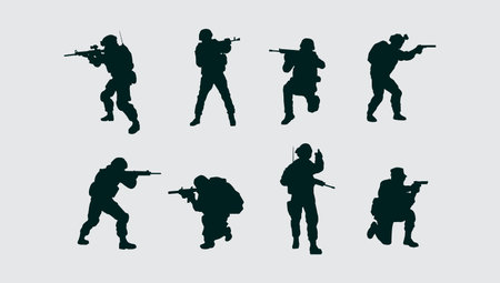 Soldier silhouettes. Vector illustration of a soldier in action.のイラスト素材